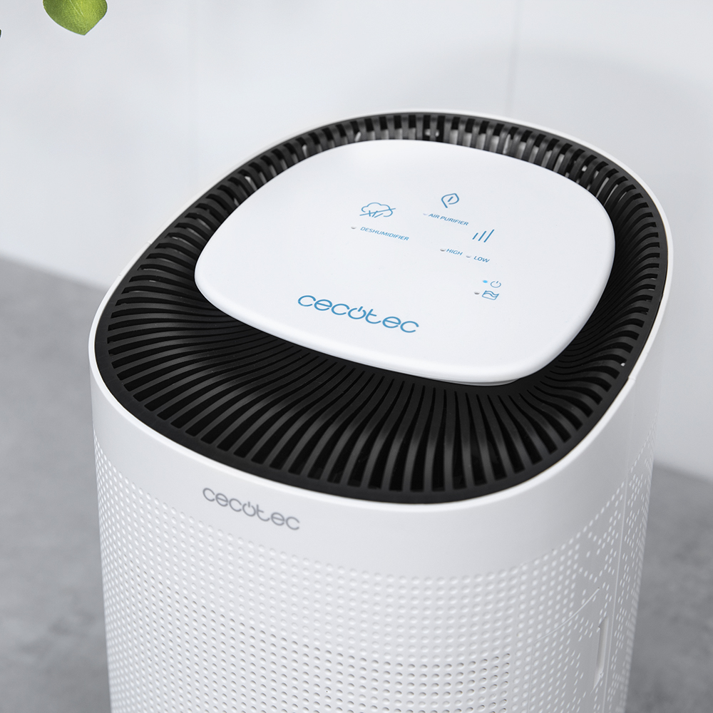 Purificador de aire blanco con tapa negra y controles. La parte superior tiene la marca CECOTEC.