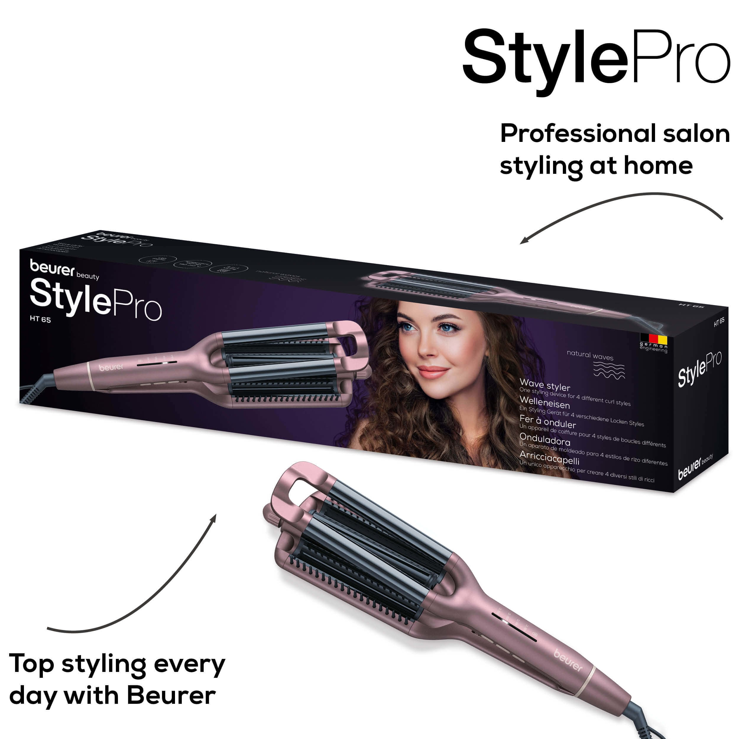 Ein Haarstyling-Werkzeug in einer Box. Es hat ein Bild einer Frau auf der Box und das Werkzeug ist unten sichtbar.