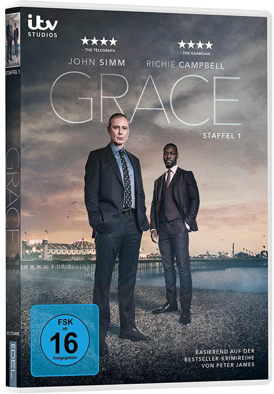 DVD-Hülle der Serie Grace. Zwei Männer in Anzügen stehen vor einem bewölkten Himmel mit Pier im Hintergrund.