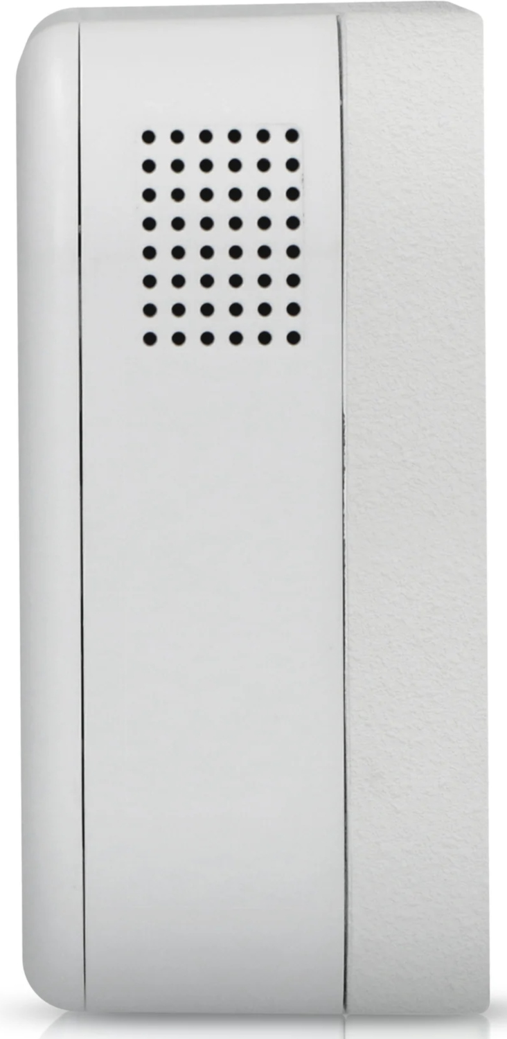 A white device with a grid of holes and a smooth side. It is likely a smoke detector.