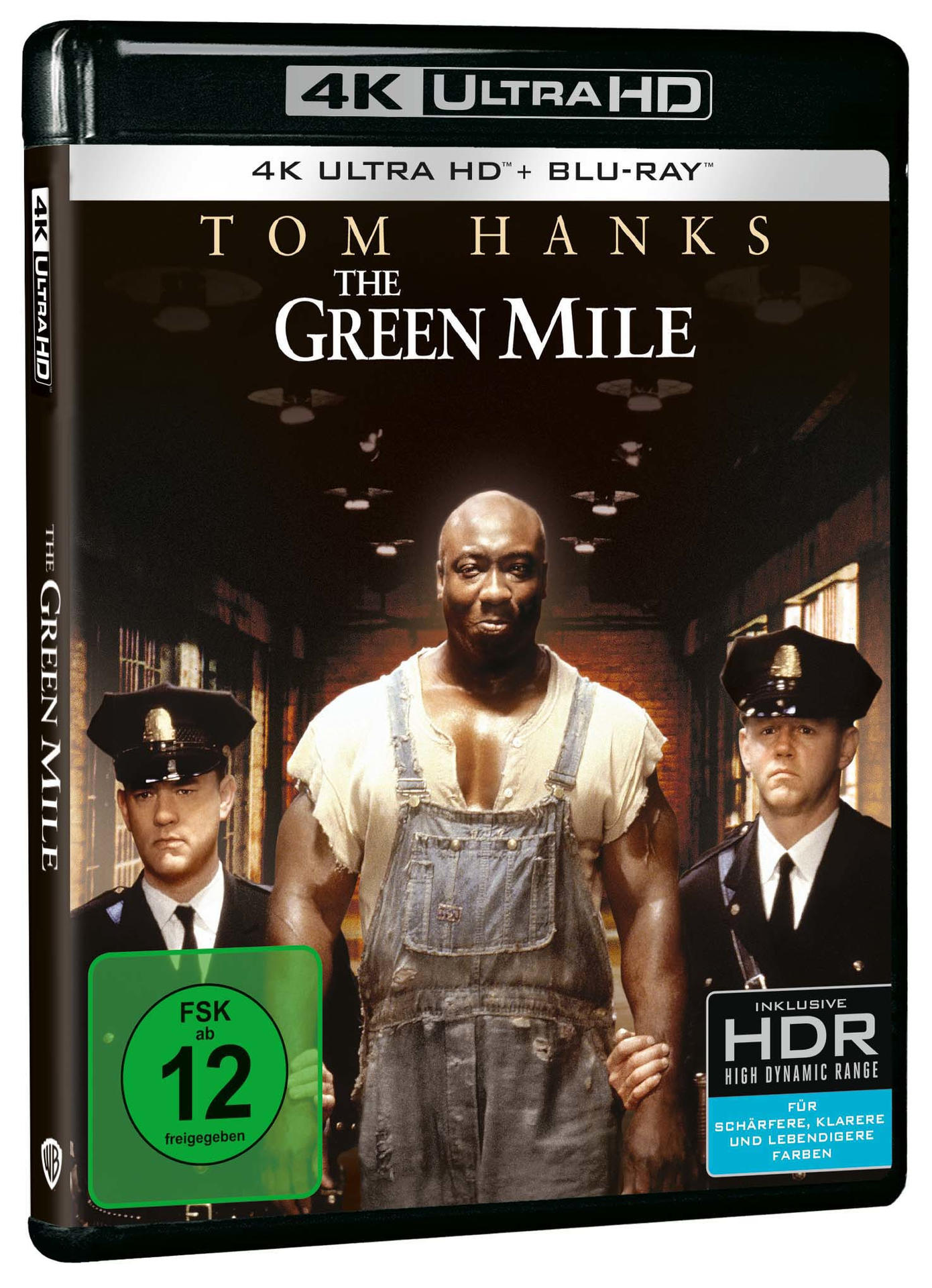 DVD-Hülle von 'The Green Mile'. Tom Hanks und zwei Wachen sind auf dem Cover. Schwarzer Hintergrund.