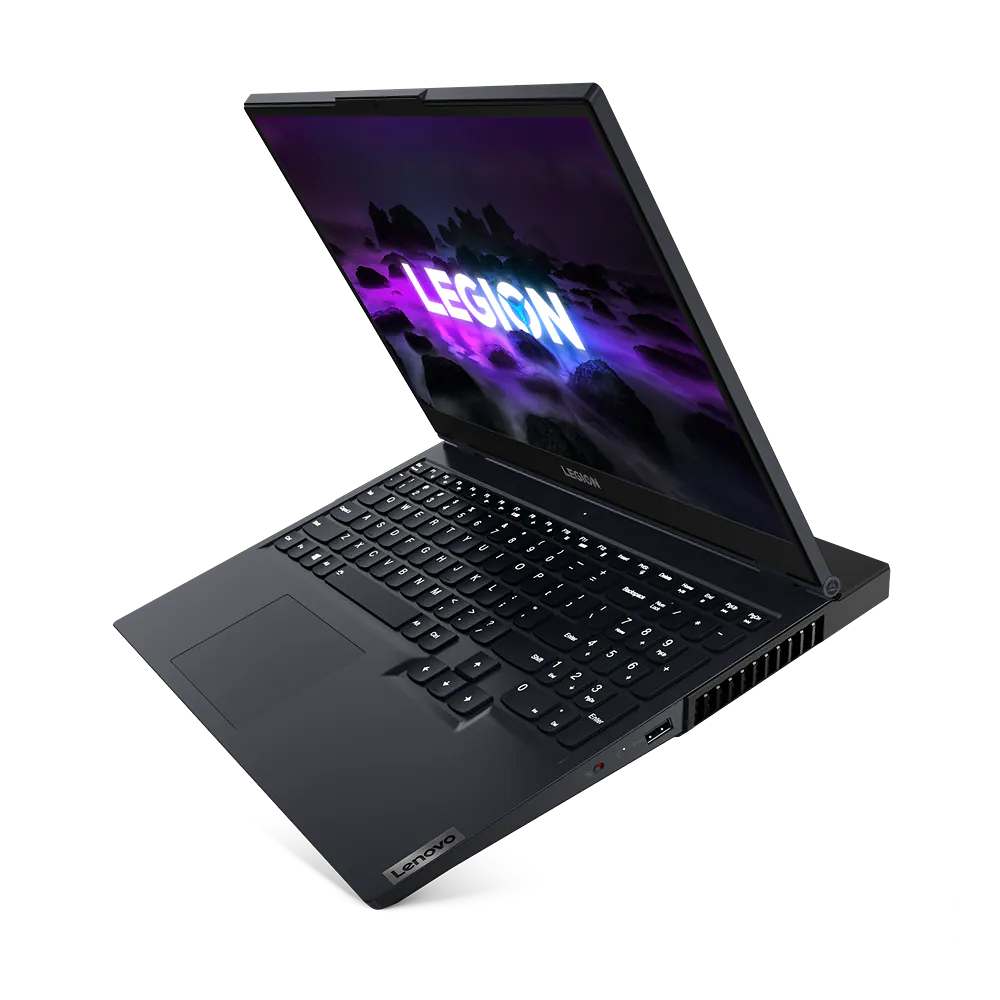 Un portátil Lenovo Legion negro sobre un fondo negro. La pantalla muestra la palabra 'LEGION'.