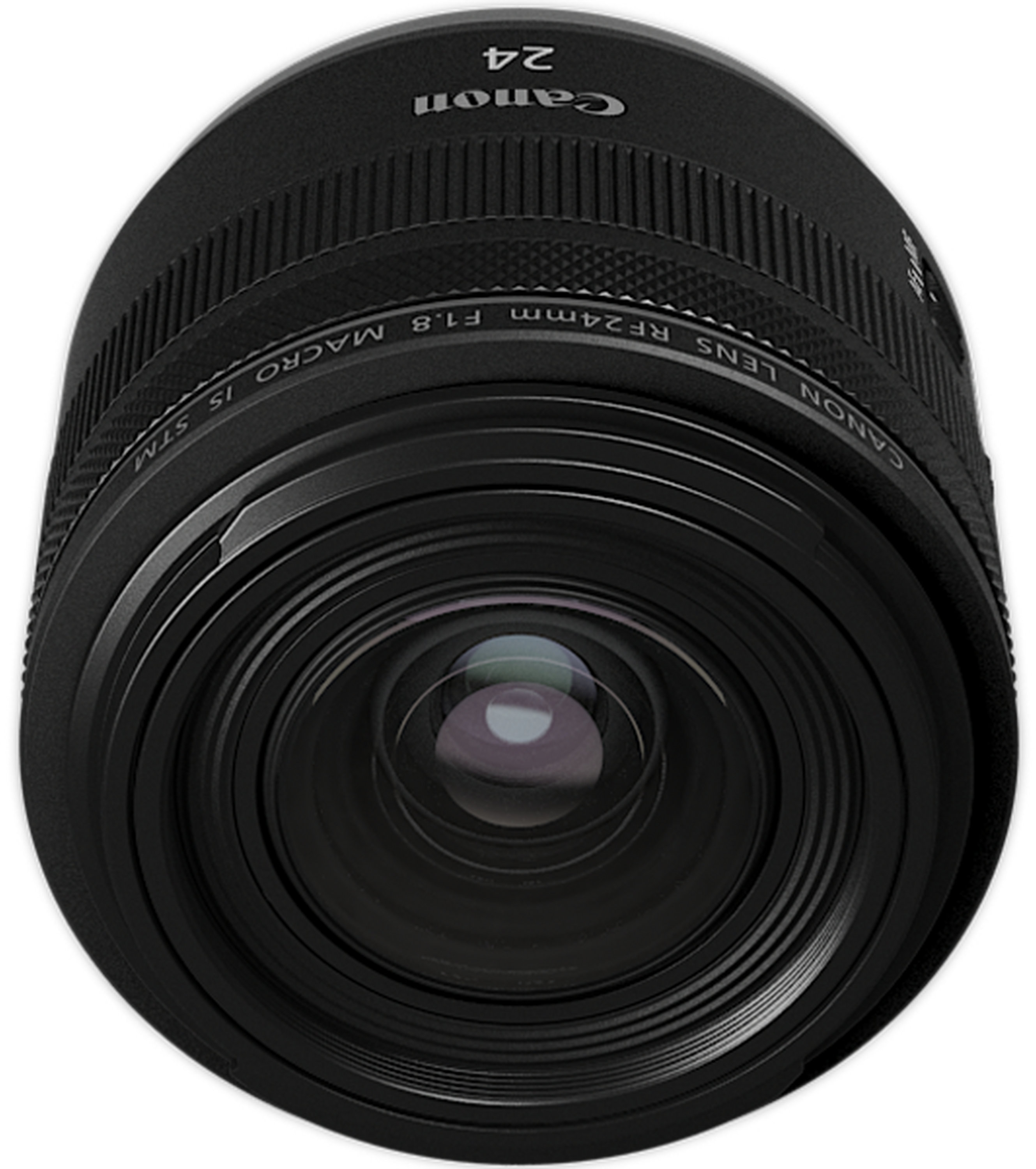 Un obiettivo macro Canon RF 24mm f/1.8 nero visto frontalmente su sfondo nero.