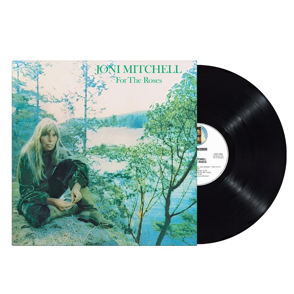 Vinylplaat en albumhoes van Joni Mitchells For The Roses, met groen gebladerte.