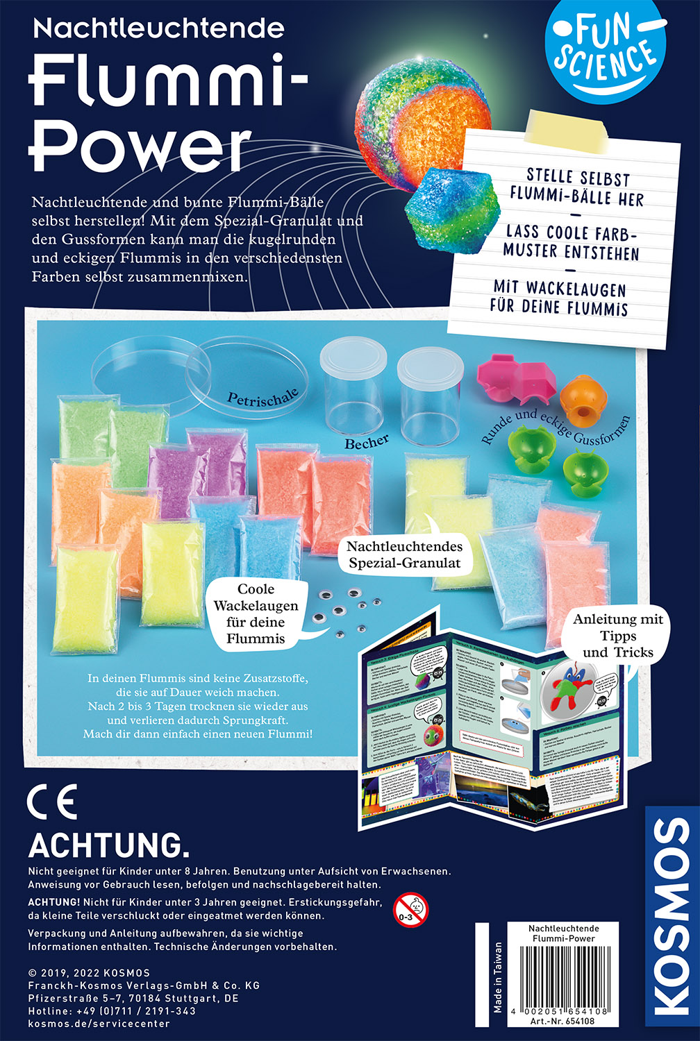 Bunte Spielzeugverpackung mit Text, Bildern von Kugeln, Formen und Anweisungen. Weißer Hintergrund.