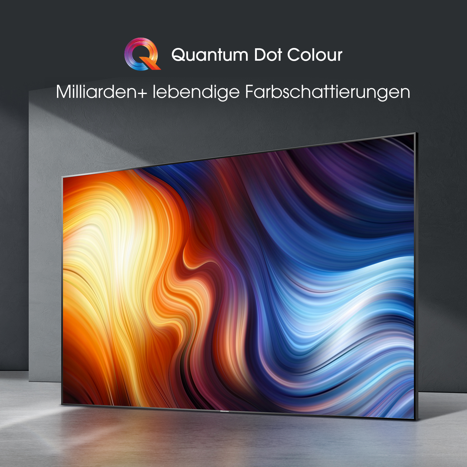Ein großer Flachbildfernseher mit abstrakter Kunst und einem weißen Hintergrund und Text.