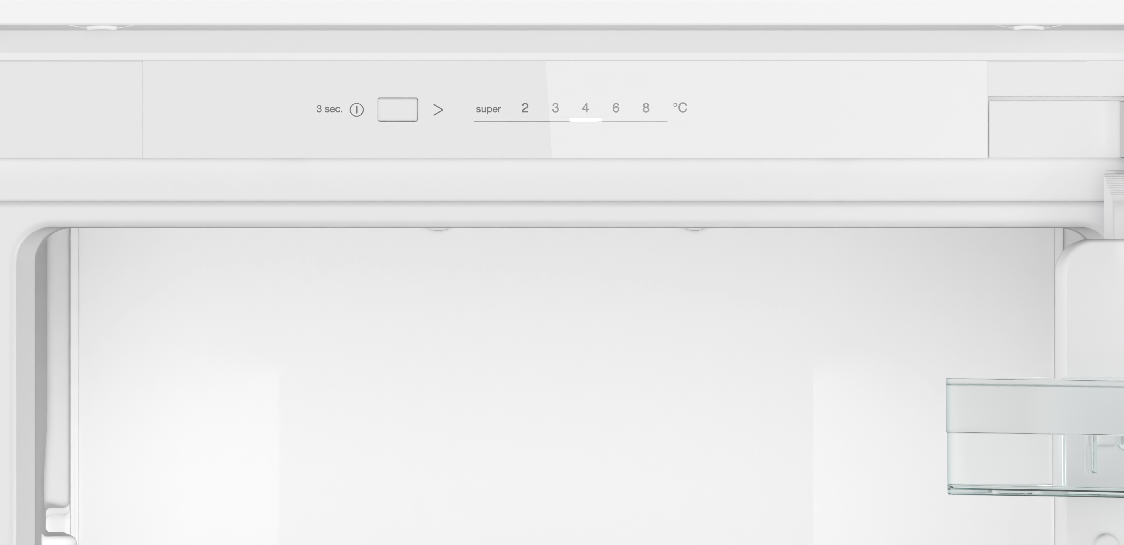 Fridge interior with temperature controls. White interior.
