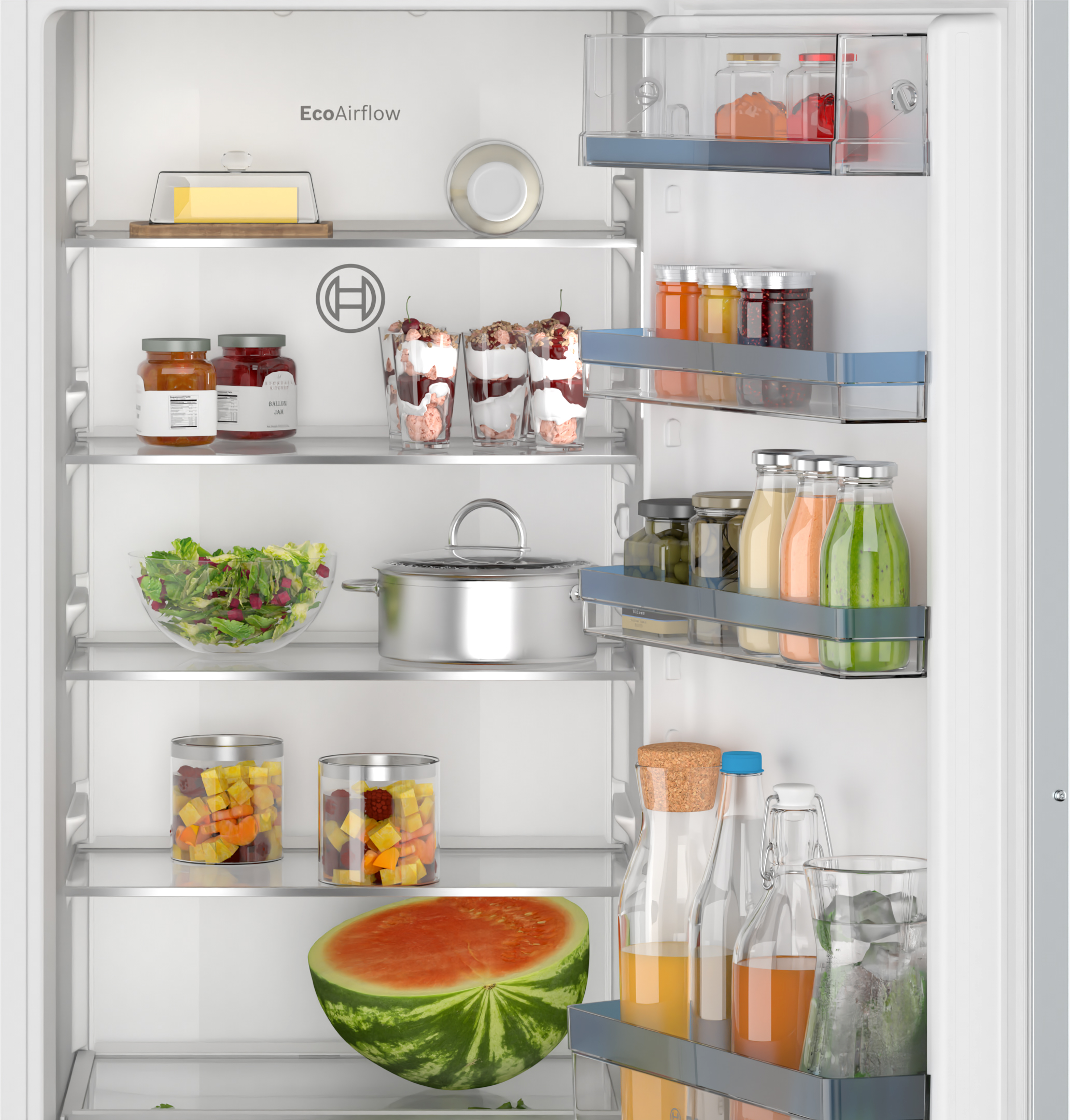 Refrigerator interior. Shelves with food items like vegetables, fruits, and jars.