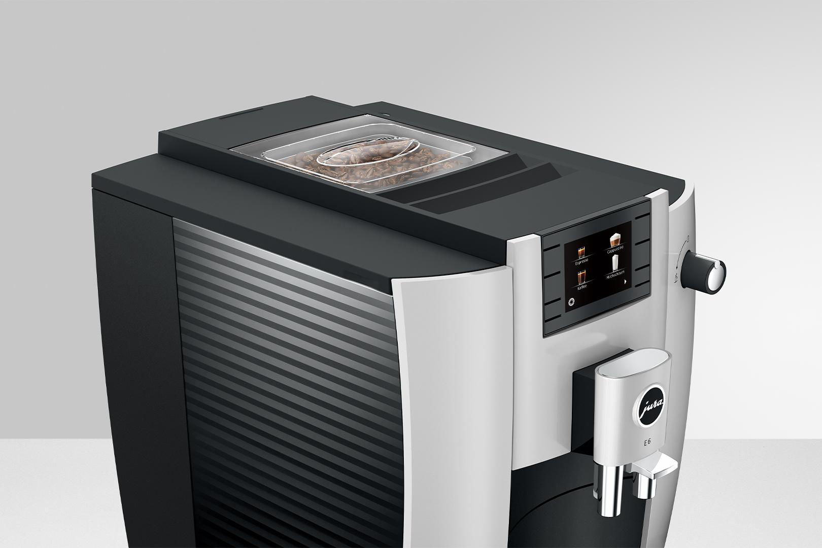 Kaffeemaschine mit Bohnenbehälter und Touchscreen.