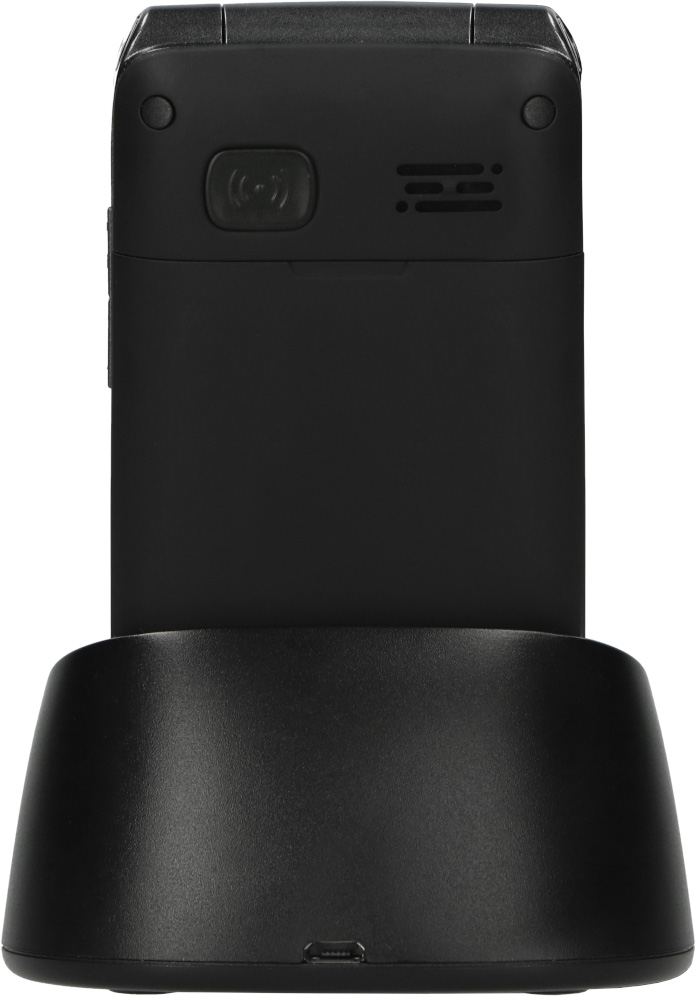 Un téléphone à clapet noir dans un socle de chargement. Le téléphone et le socle sont noirs.