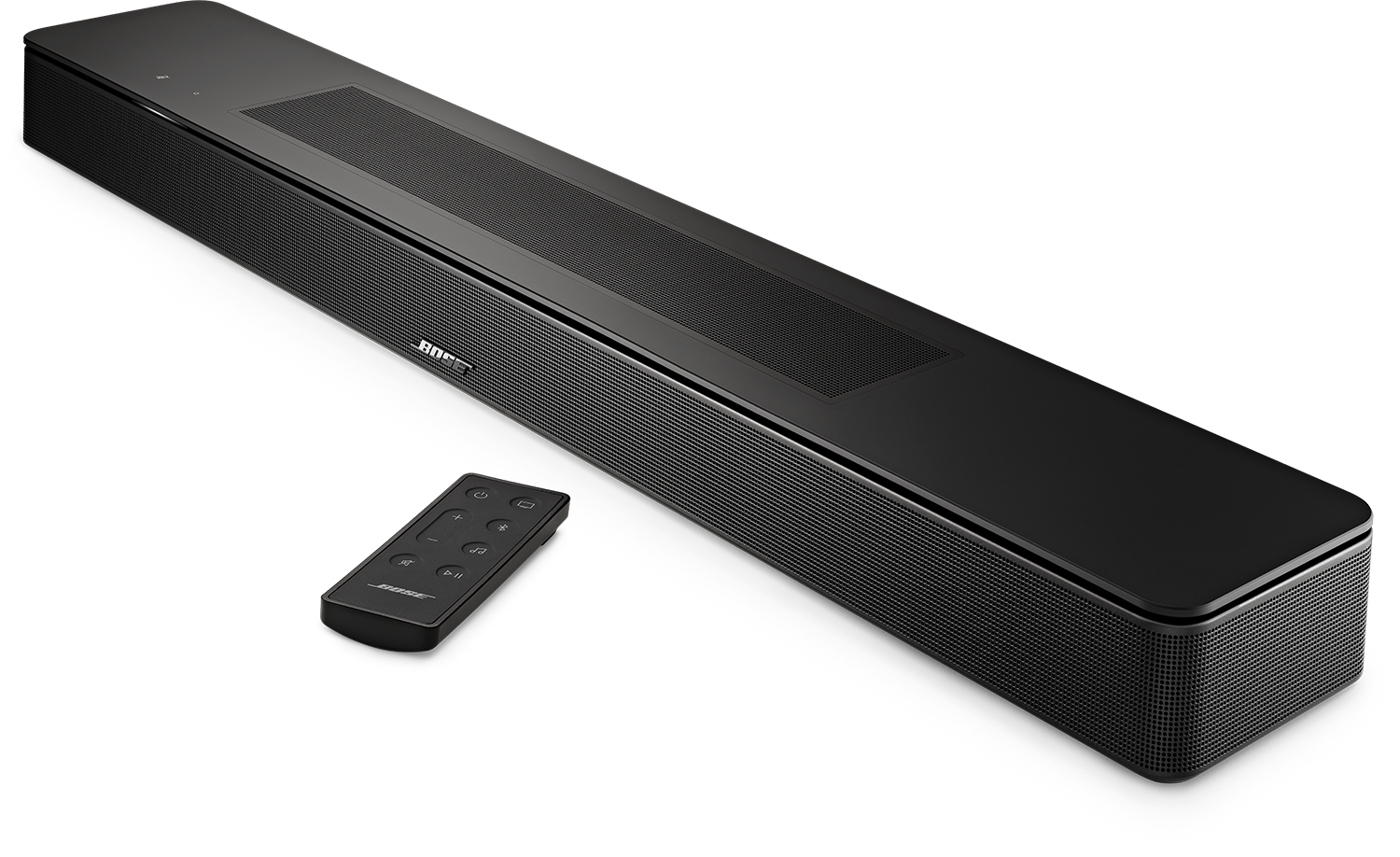 Zwarte Bose soundbar en afstandsbediening. Zwart oppervlak, eenvoudige productfoto. Zwarte achtergrond.