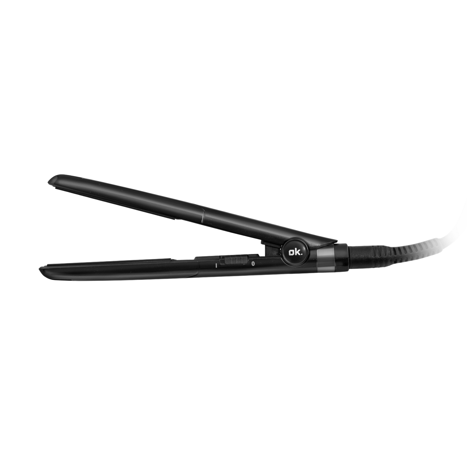 A black hair straightener, a styling tool, on a black background.