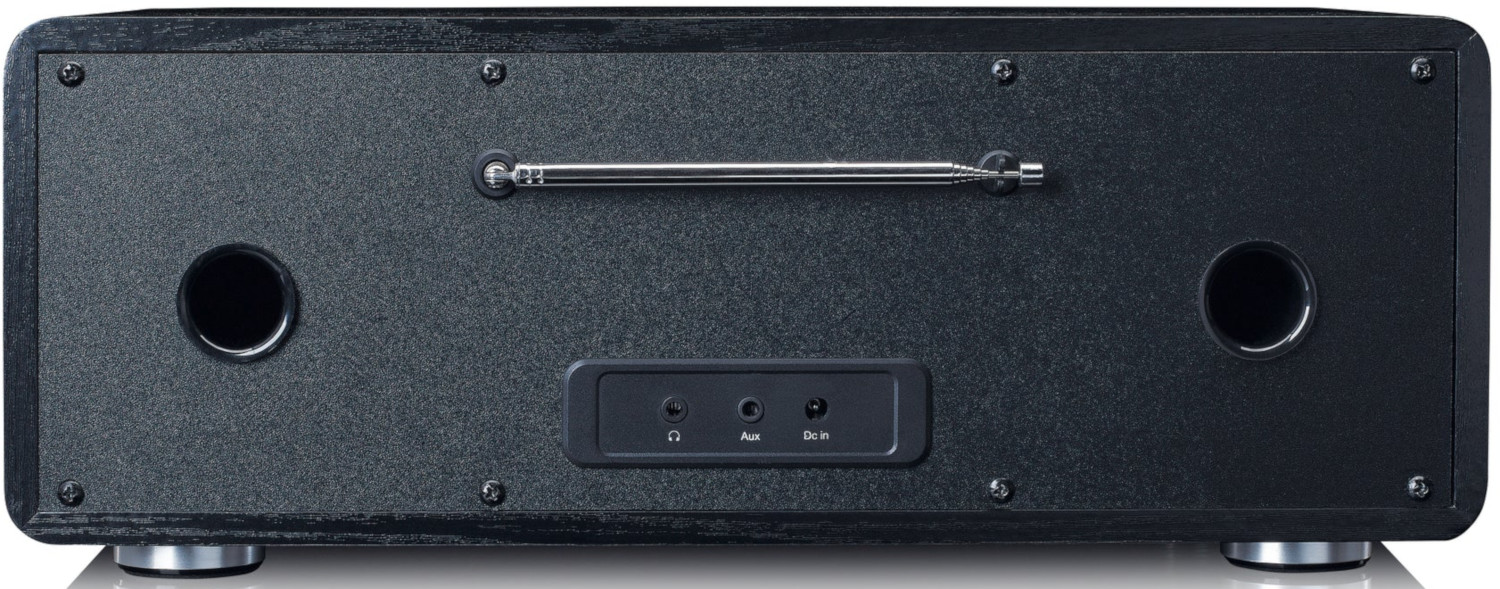 Black wooden radio with two speakers, an antenna, and input ports.