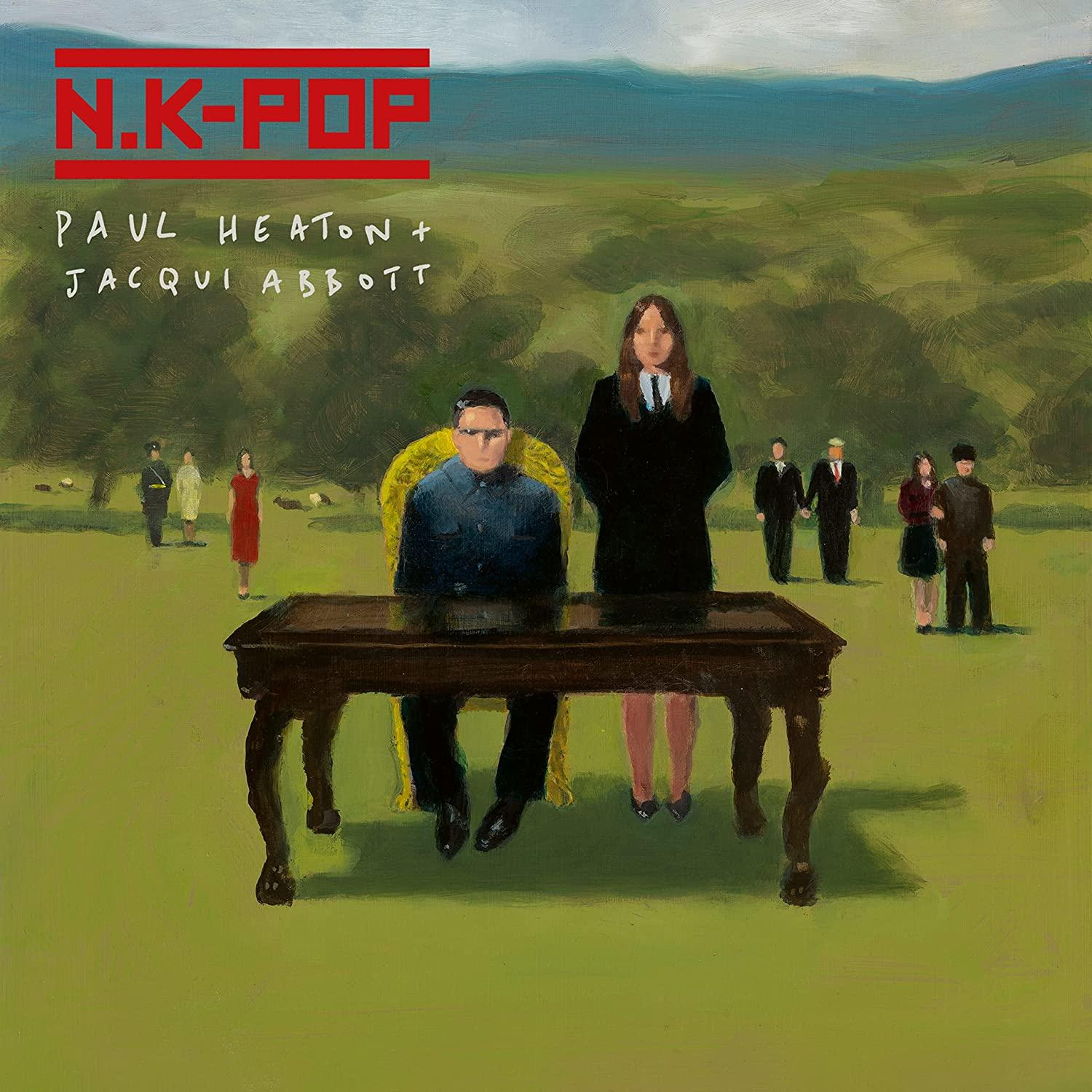 Albumcover mit zwei Personen an einem Tisch. Text lautet 'N.K-POP' und 'Paul Heaton + Jacqui Abbott'.
