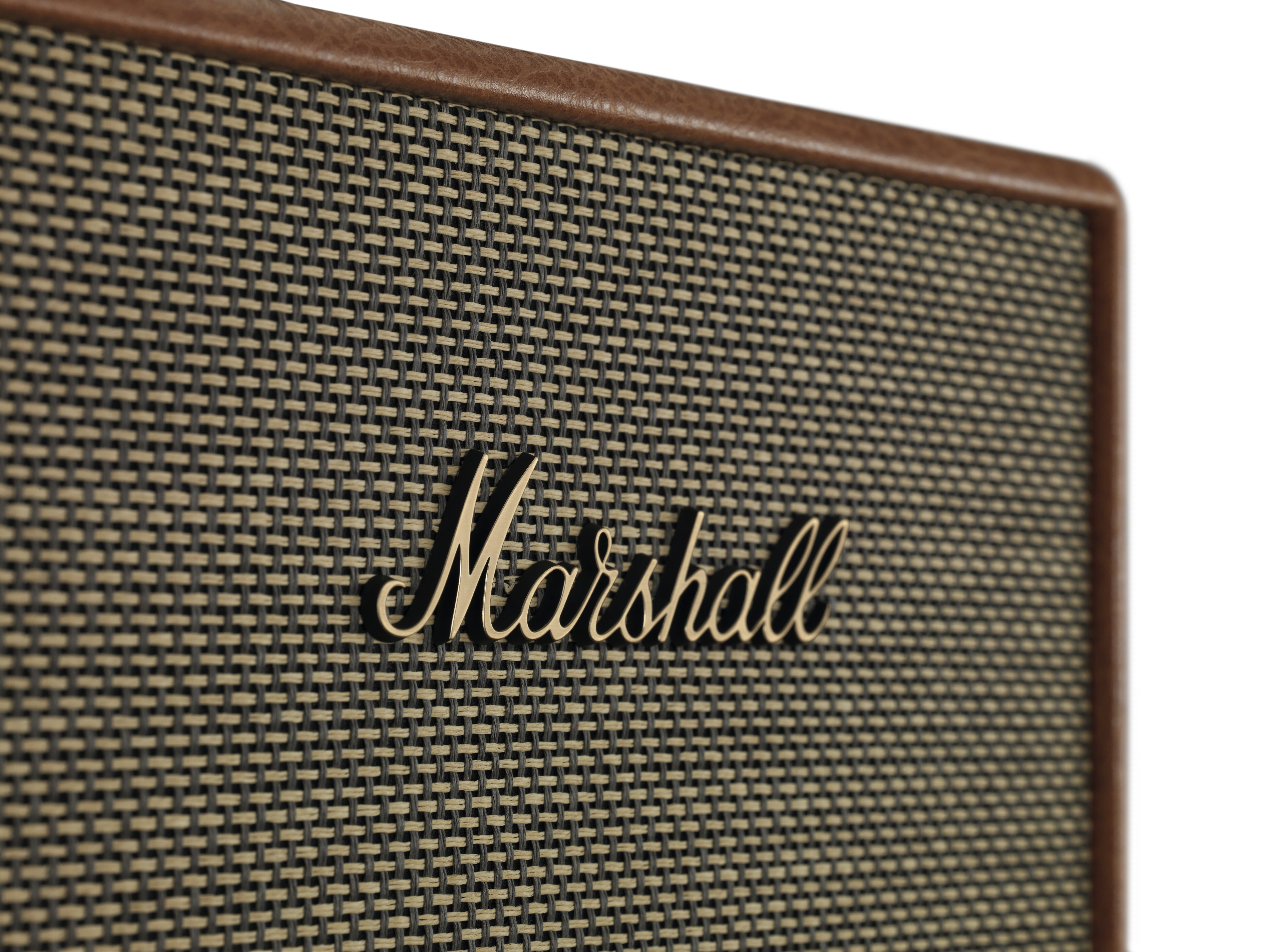 Nahaufnahme eines Marshall-Lautsprechers mit sichtbarem Logo.