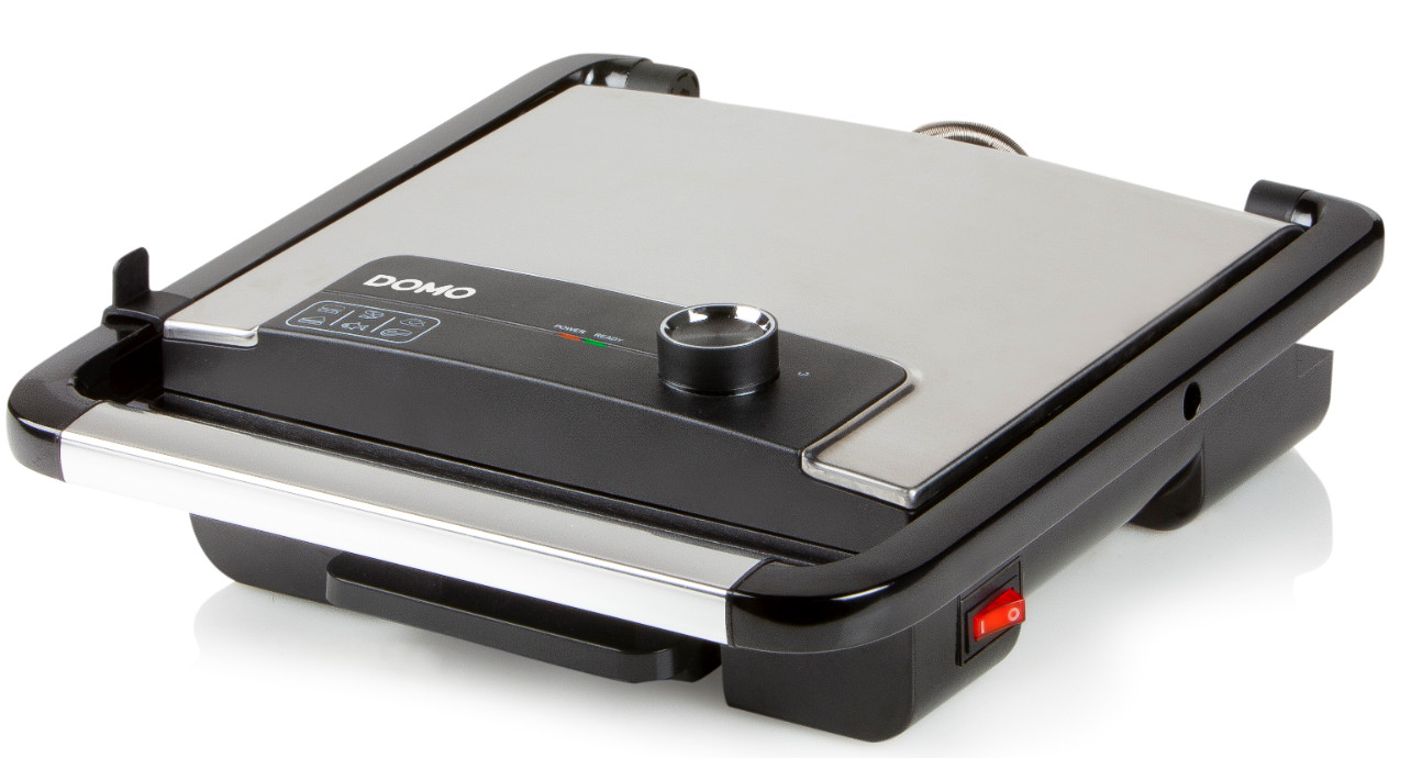 A silver and black sandwich press, open.