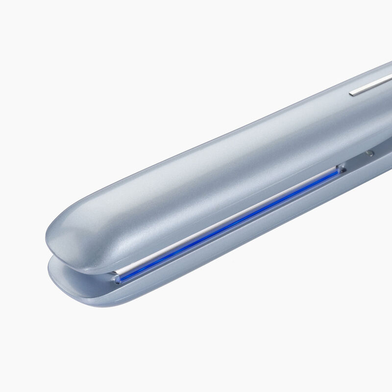 Blue hair straightener, closed. It has a blue light strip. White background and a simple look.