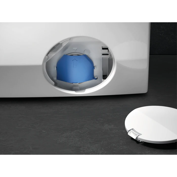 Lavadora blanca con el cajón del detergente abierto, mostrando un componente azul.