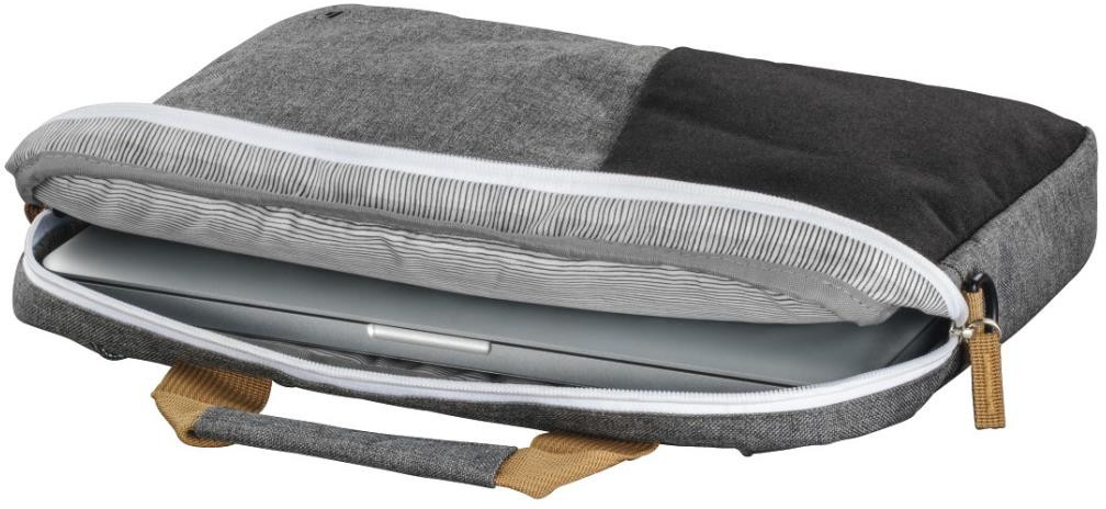 Laptop in een grijze en zwarte tas, rits open. Beige handvat, witte binnenkant.
