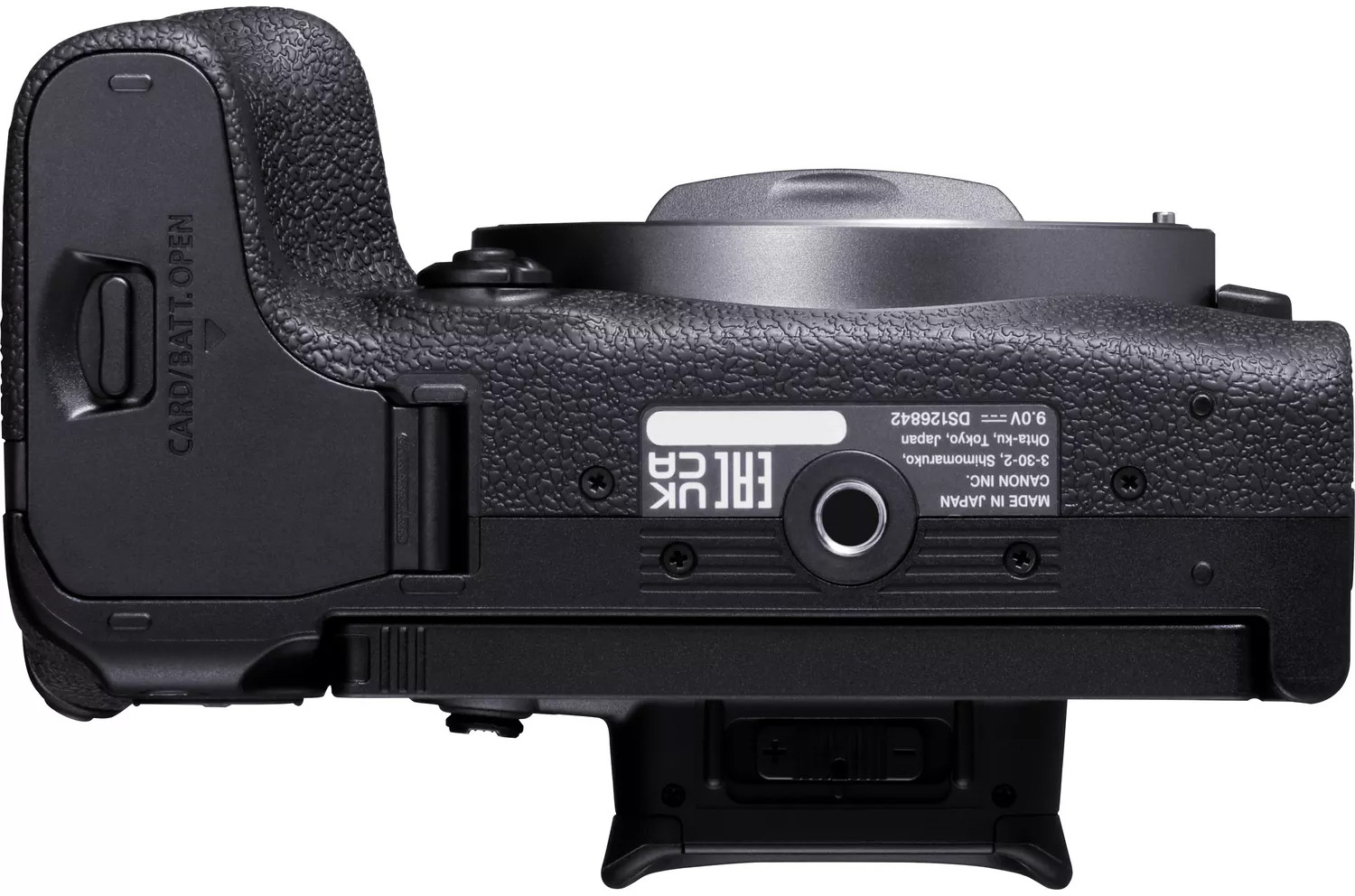 Black camera base with labels, ports, and a card slot. The surface has a textured finish.