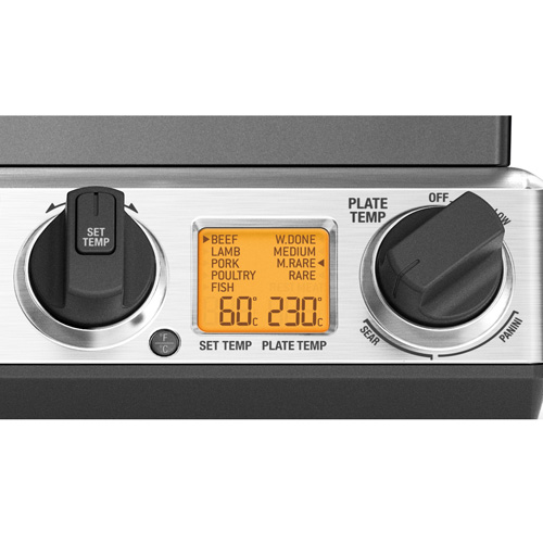 Close-up of a grill control panel showing temperature settings.