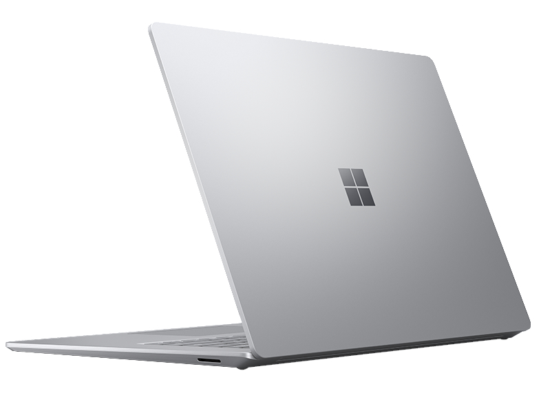 Ein silberner Laptop steht auf einer weißen Oberfläche und zeigt das Windows-Logo auf der Rückseite.