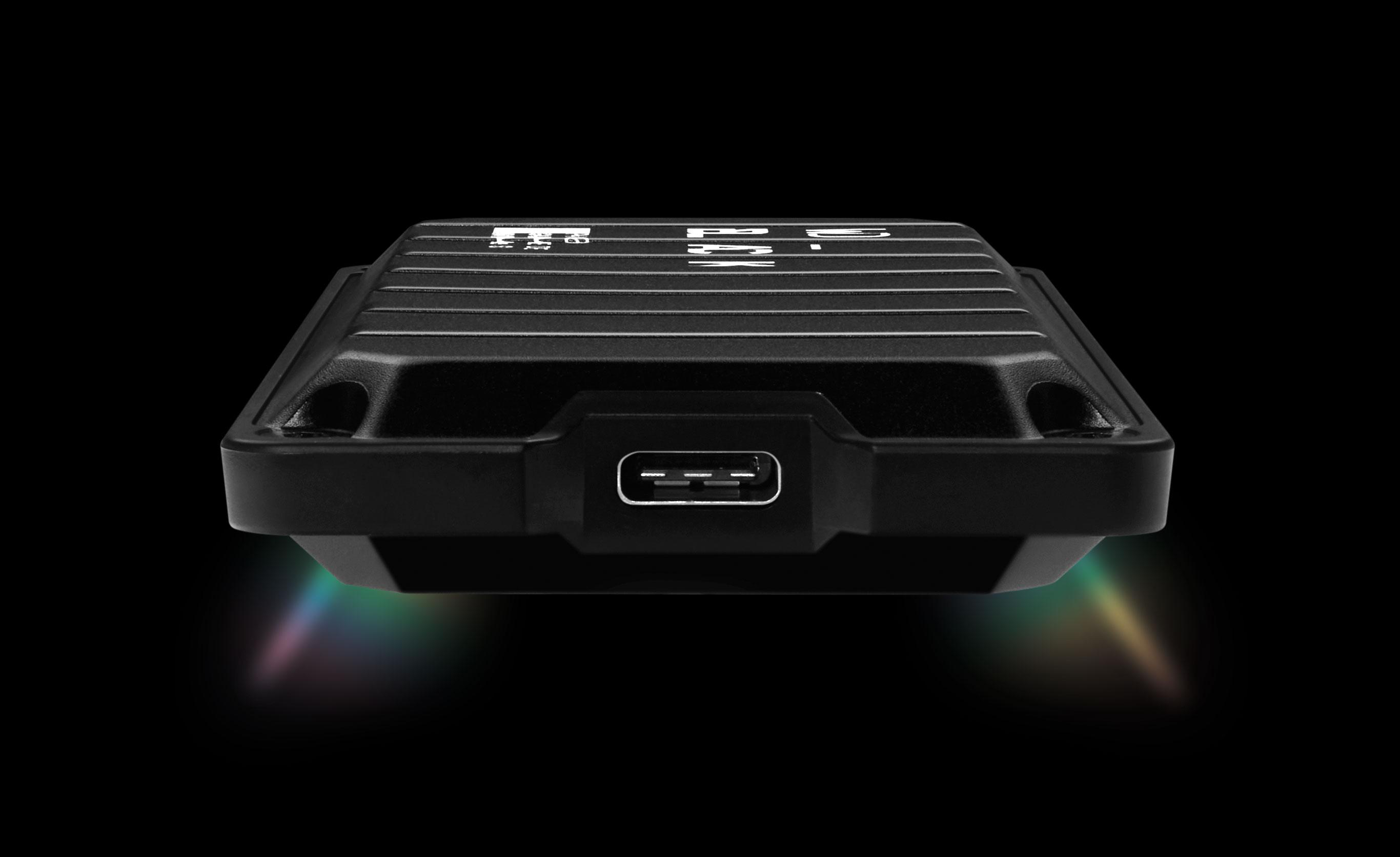 Schwarze externe Festplatte, Draufsicht mit USB-Anschluss. RGB-Lichter unten.