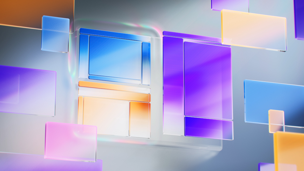 Image abstraite avec des formes rectangulaires transparentes et colorées flottant dans un espace gris clair. Éclairage doux et reflets présents.