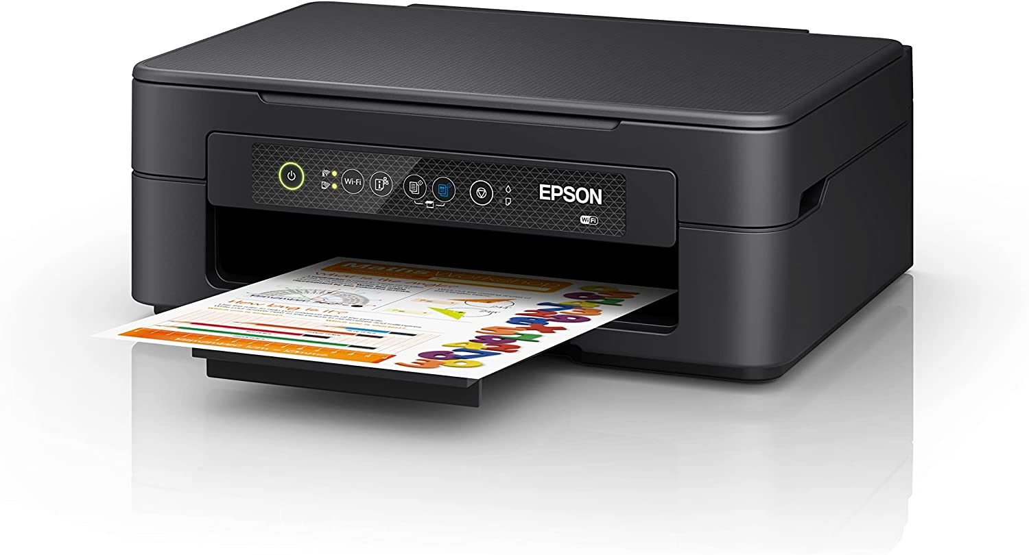 Una impresora Epson negra imprime un documento con gráficos y texto coloridos.