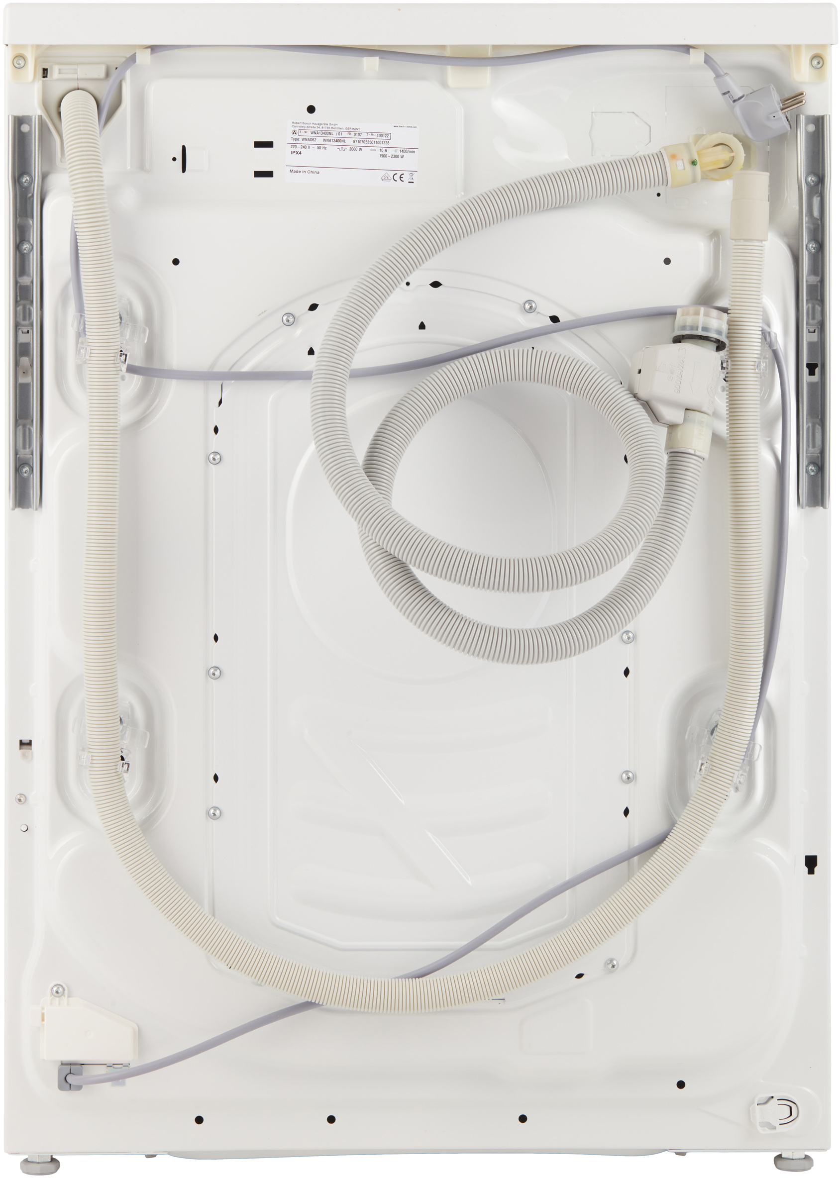 Achterkant van een witte wasmachine, met slangen en andere componenten.
