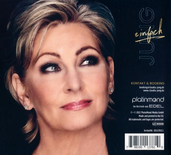 Porträt einer Frau mit blonden Haaren und Make-up, Schriftzug und Kontaktdaten.