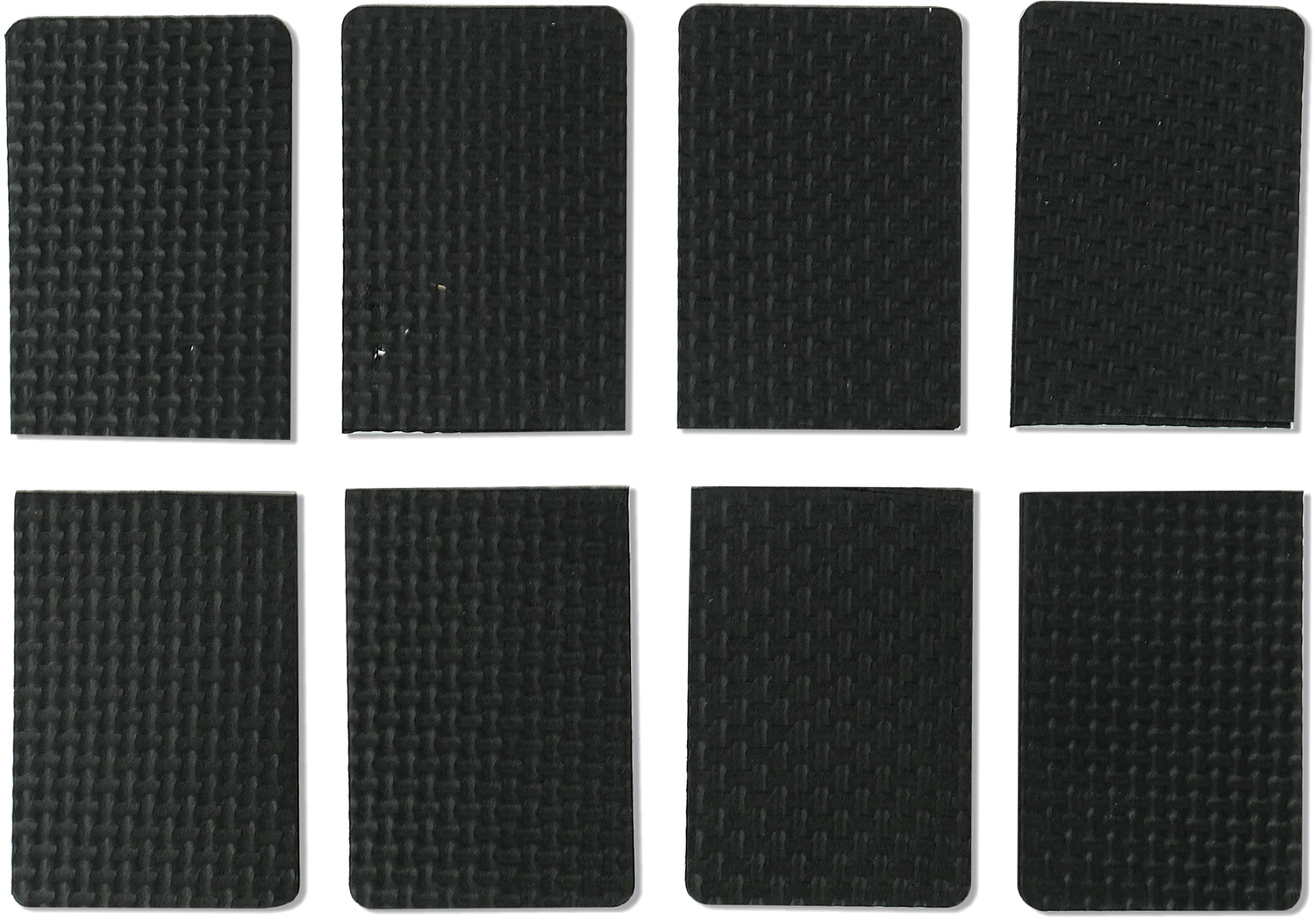 Eight black rectangular foam pads, arranged in two rows of four.