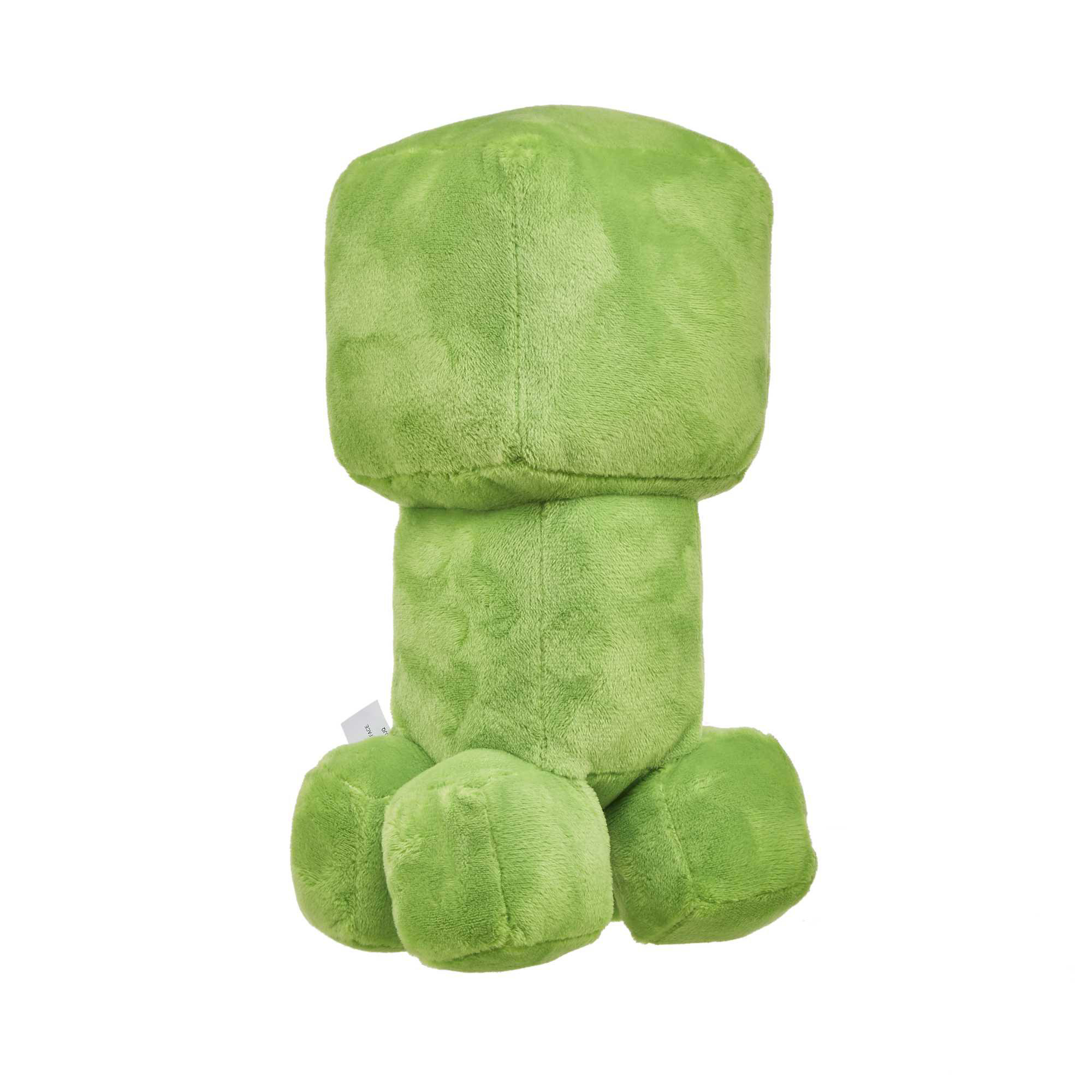 Grünes Plüsch-Minecraft-Creeper-Spielzeug. Steht aufrecht mit vier Beinen und einem quadratischen Kopf.