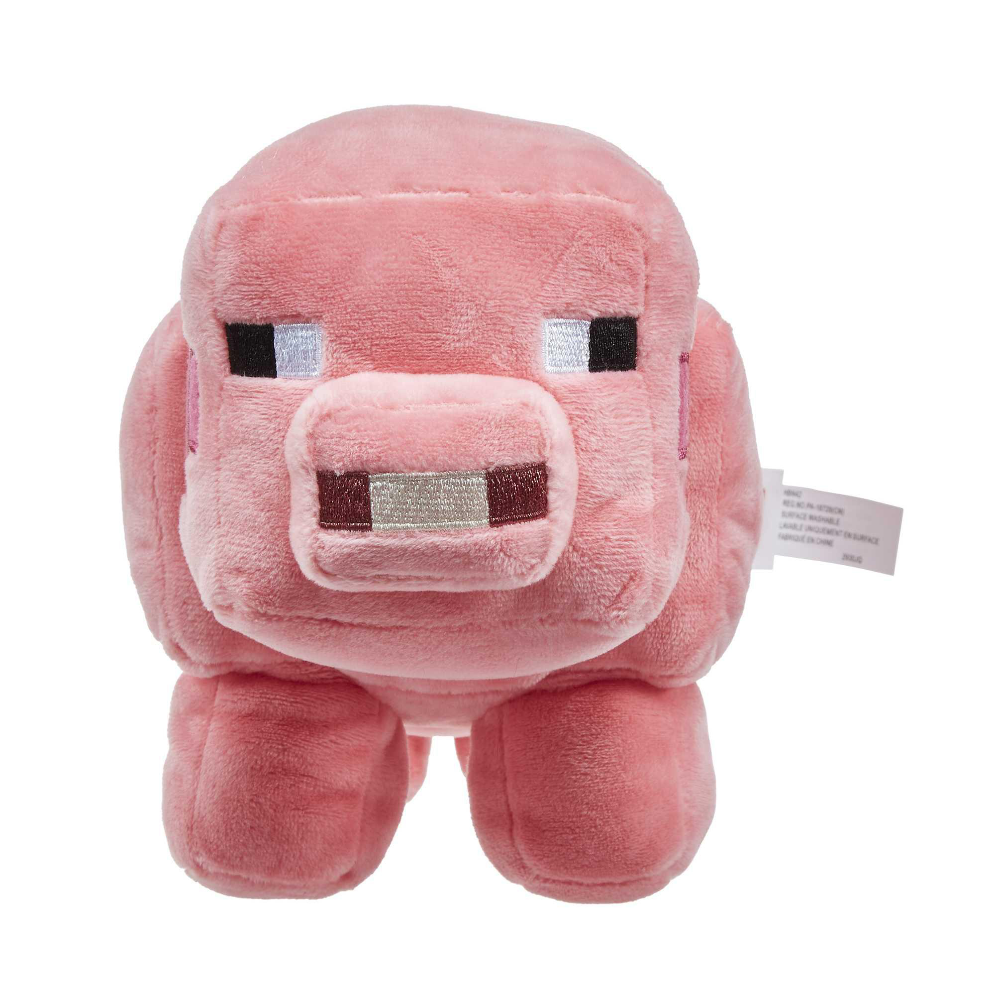 Ein rosa Plüschschwein mit schwarz-weißen Augen und einem lächelnden Mund.