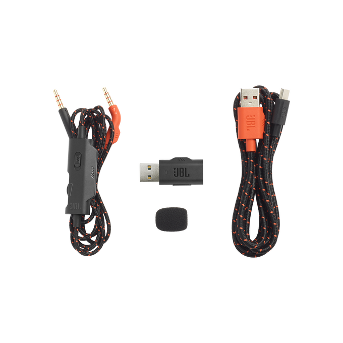 Auriculares JBL y accesorios: cables, adaptador, dongle USB y una pequeña cubierta de espuma.