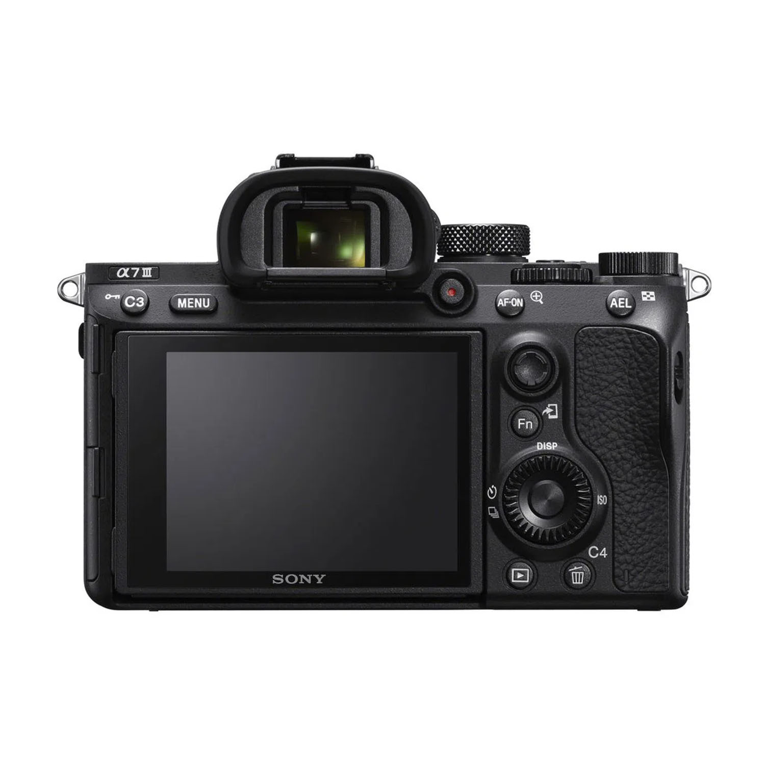 Il retro di una fotocamera Sony α7 III nera. Lo schermo è nero e la fotocamera si trova su una superficie bianca.