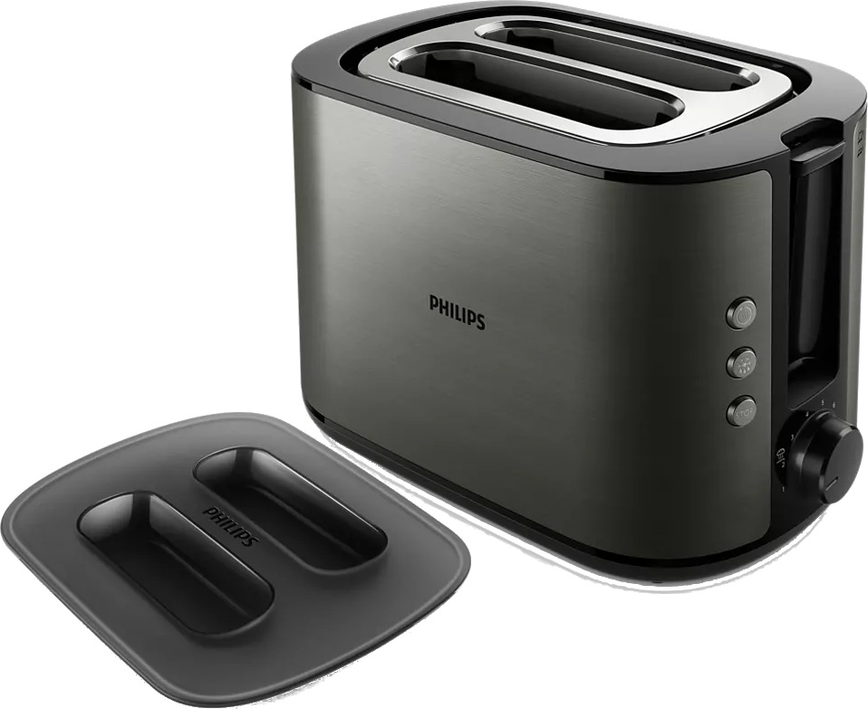 Egy rozsdamentes acél Philips kenyérpirító morzsatálcával, sötét háttéren.