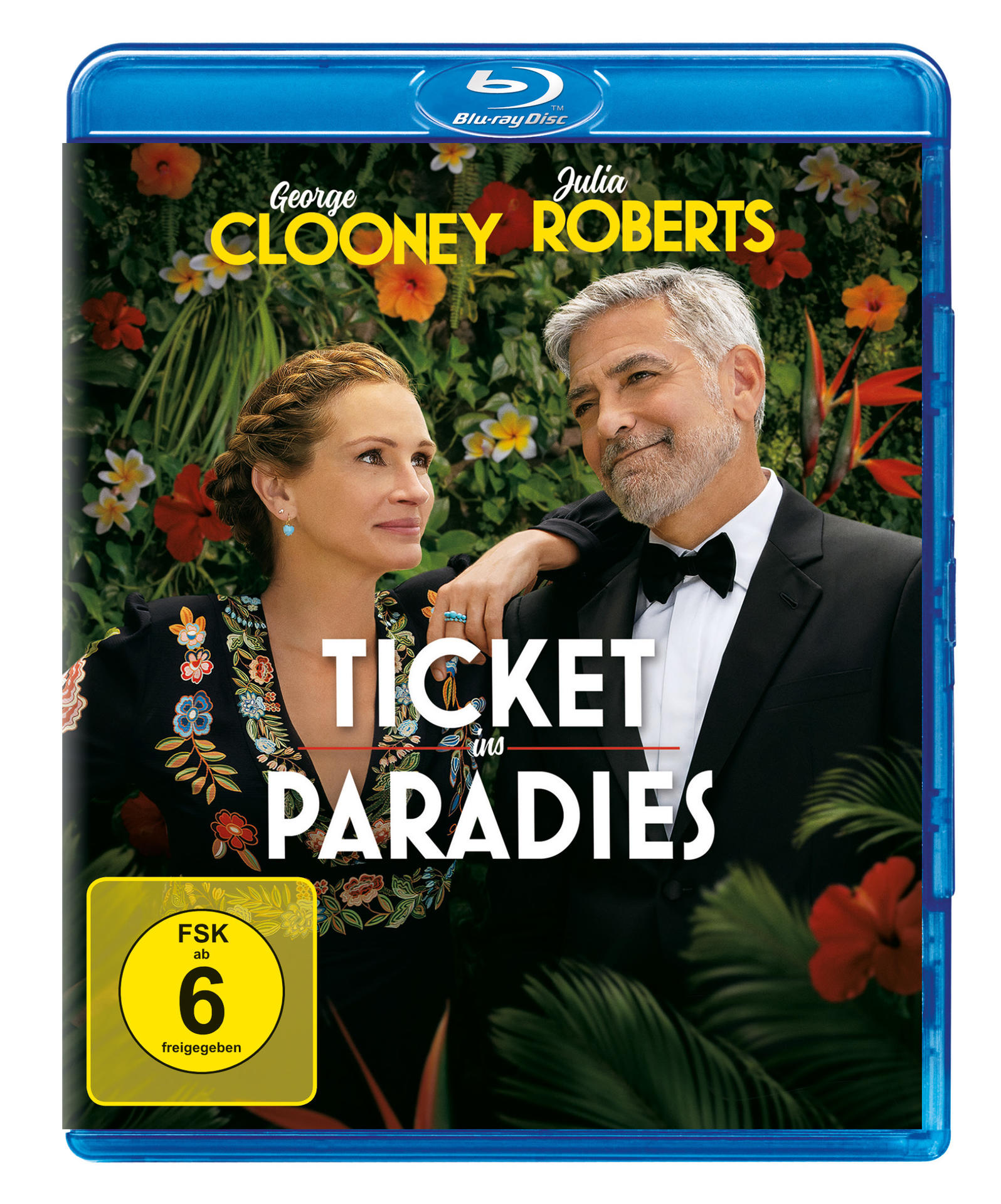 George Clooney und Julia Roberts auf Blu-ray-Hülle, umgeben von tropischen Pflanzen.
