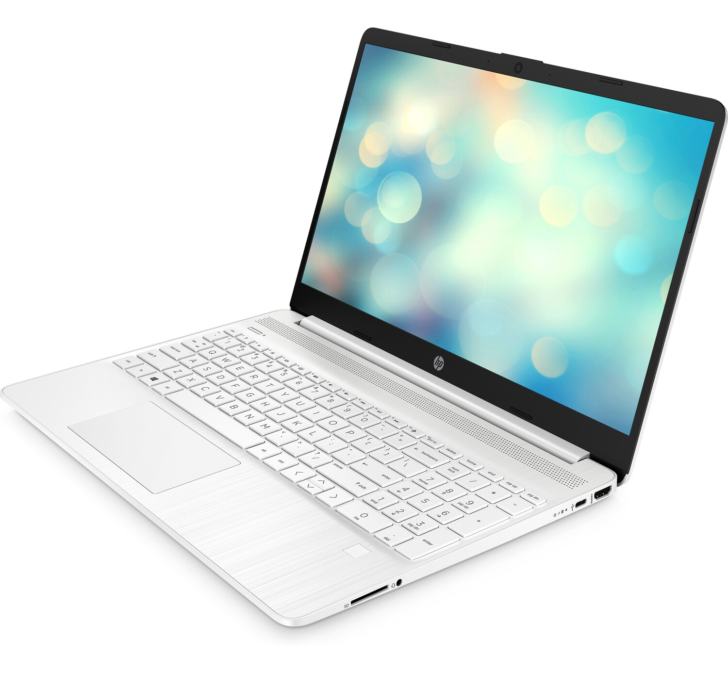 Portátil blanco con una pantalla borrosa. Abierto sobre una mesa blanca.