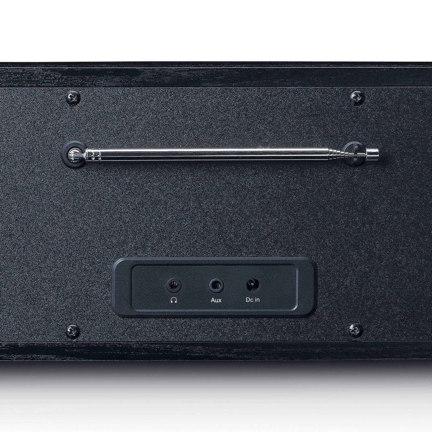 Back of a black stereo receiver with ports for headphones, aux and DC in.