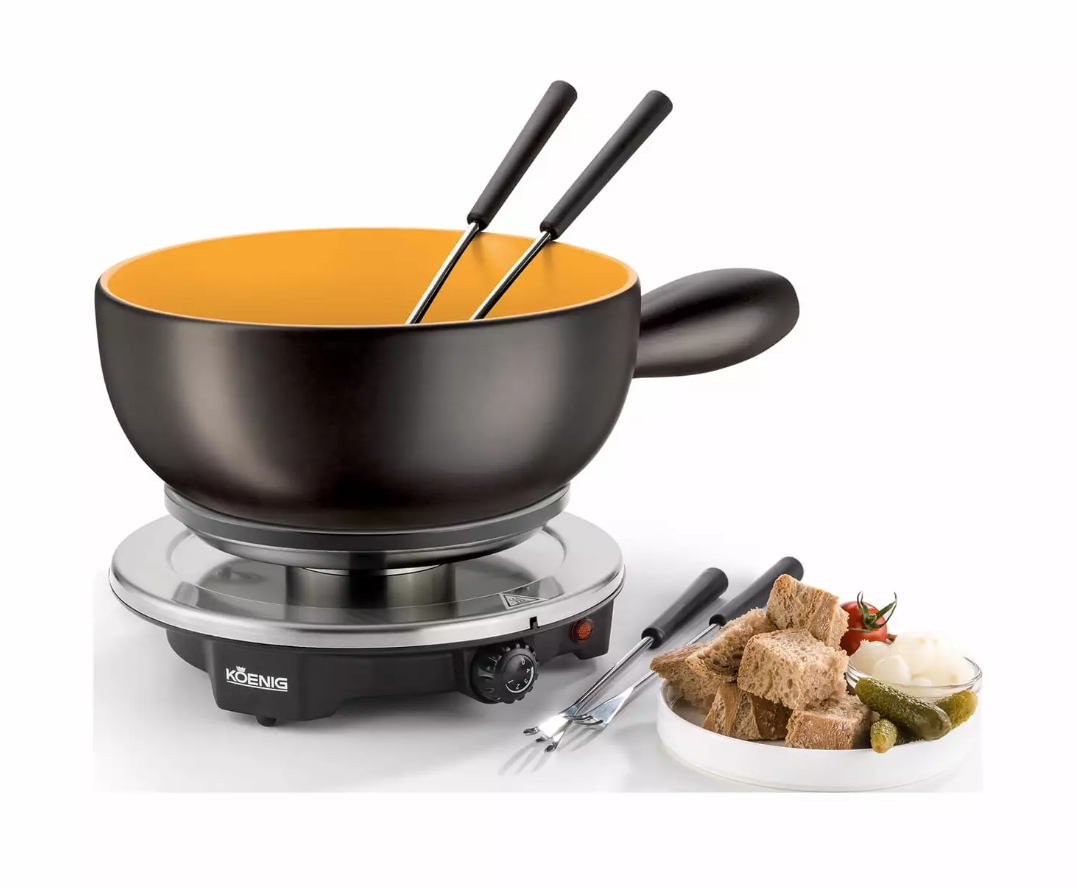 Service à fondue avec pot noir, intérieur jaune, sur socle électrique, avec fourchettes.