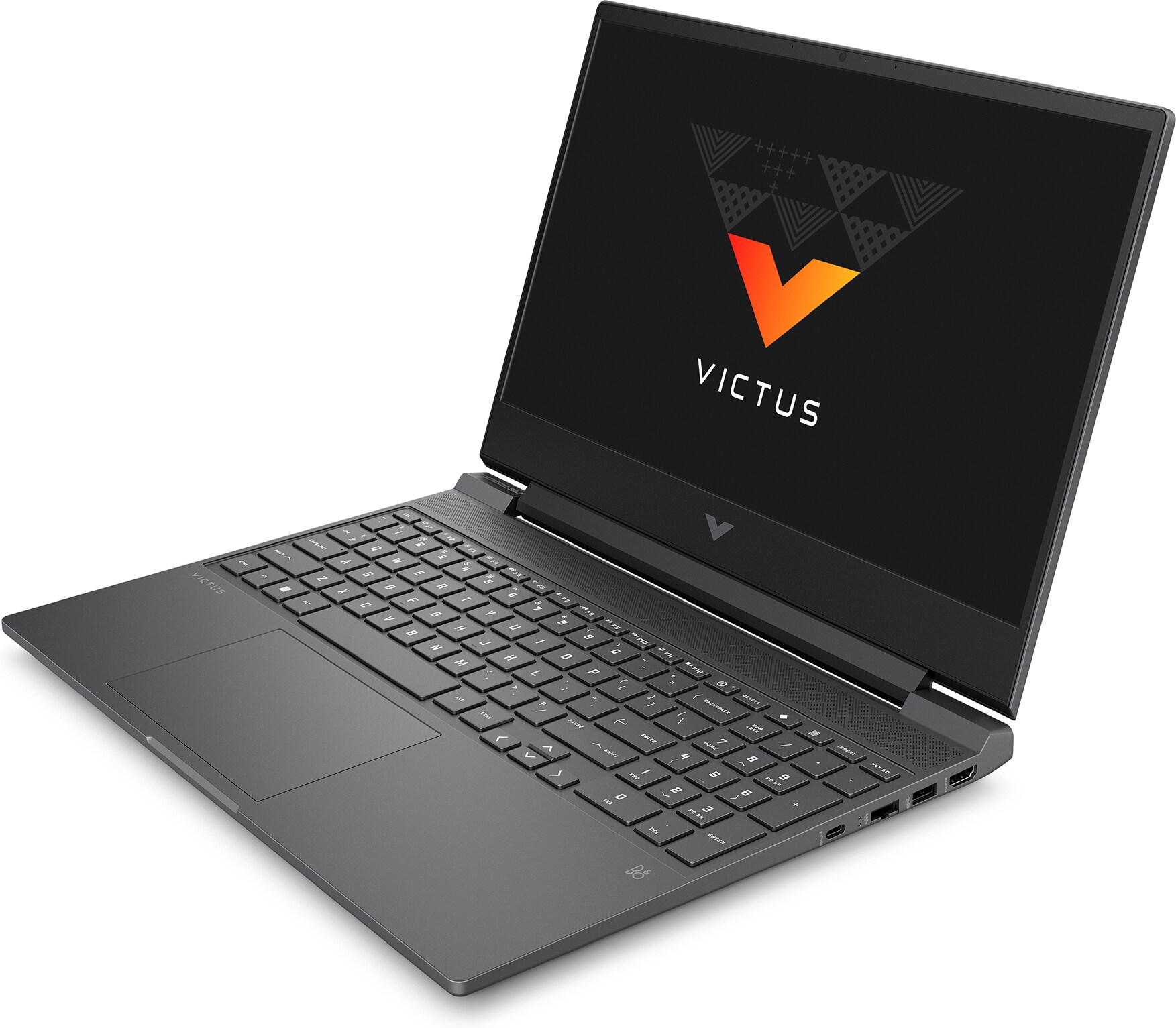 Ordenador portátil abierto. La pantalla muestra el logotipo 'VICTUS'. Cuerpo gris oscuro. Fondo blanco.