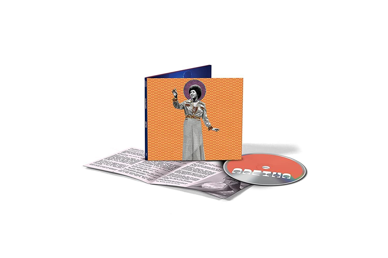 Album borítója Aretha Franklinnal ruhában, CD-vel és füzettel fehér háttérrel. Narancssárga háttér CD címmel.