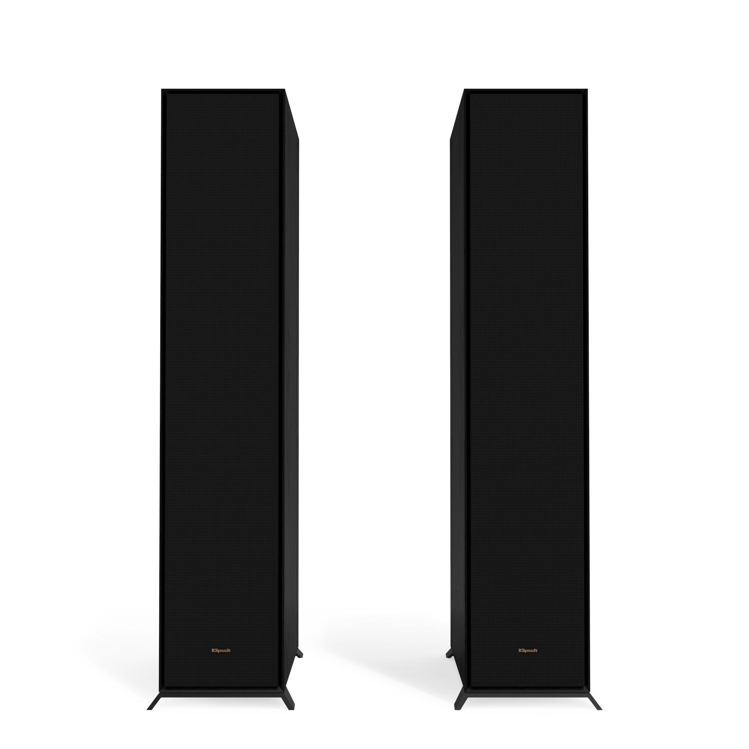 Two tall black speakers side by side, on a white surface, against a black background.
