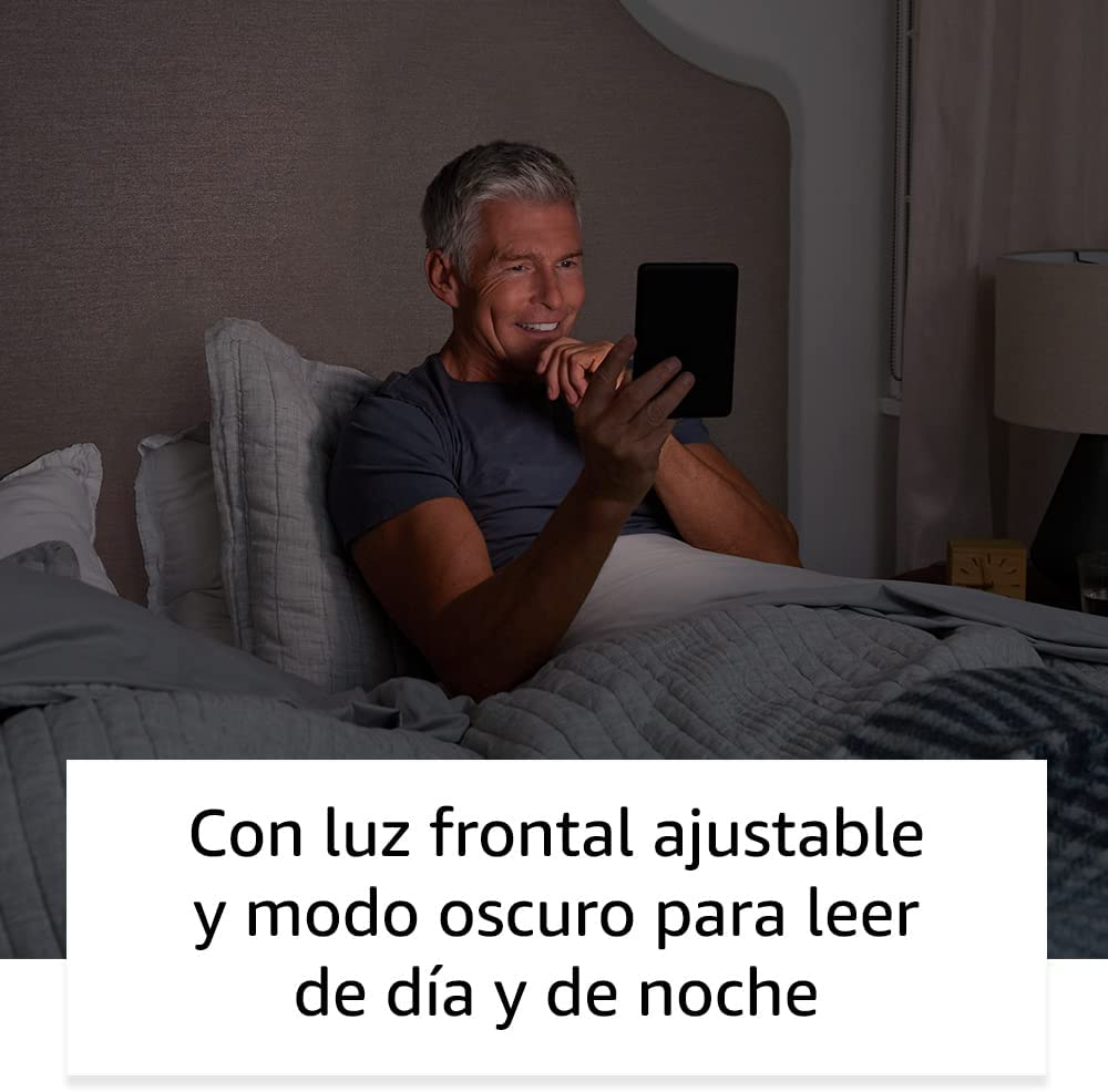 Hombre en la cama leyendo una tableta por la noche, con luz frontal ajustable y modo oscuro.