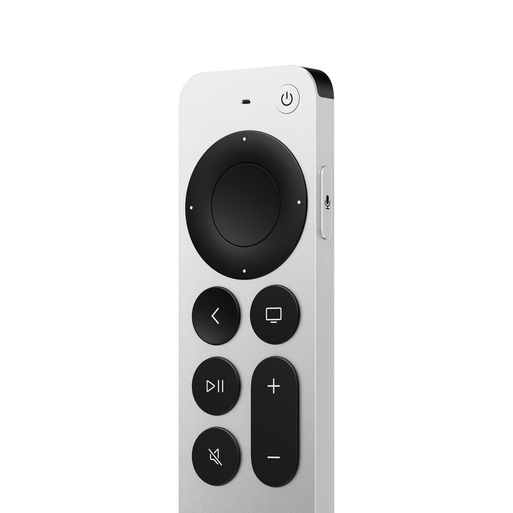 Mando a distancia de Apple TV plateado con botones, un clickpad y un micrófono, sobre fondo blanco.