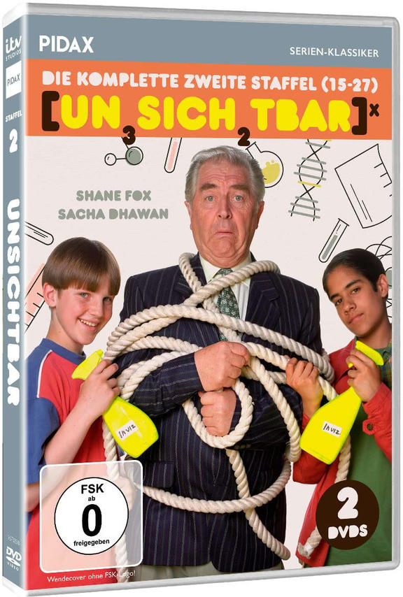 DVD-Box mit drei Personen, einem Mann im Anzug und zwei Jungen mit Sprühflaschen.
