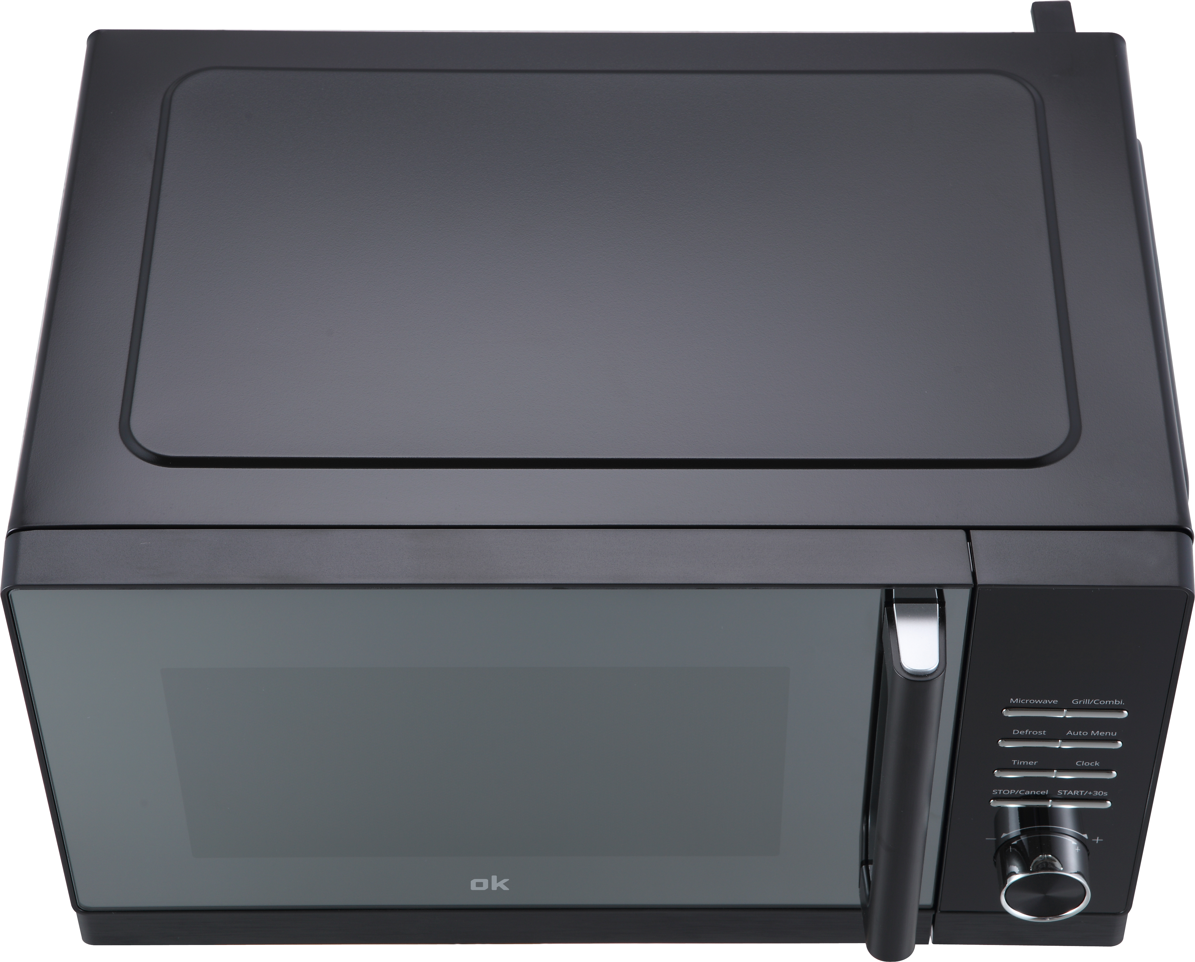 Un four à micro-ondes noir vu de dessus, avec la porte fermée.