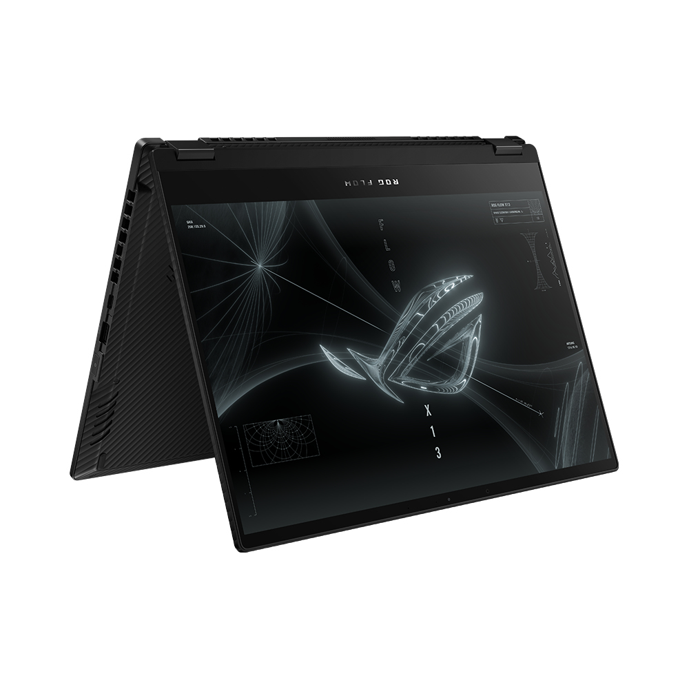 Laptop ROG negro, abierto en ángulo, mostrando un diseño abstracto en pantalla, fondo blanco.