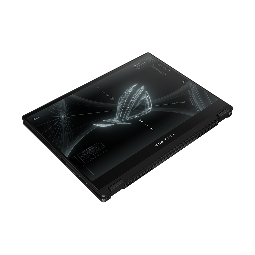 Laptop negro, abierto, vista en ángulo. La pantalla muestra un diseño futurista en blanco.